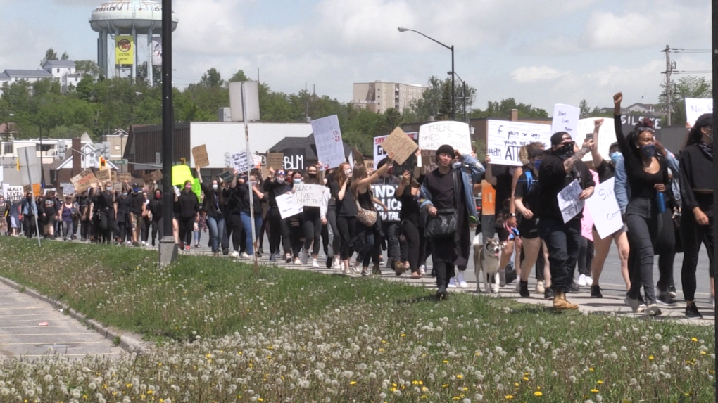 Sudbury protesters march downtown