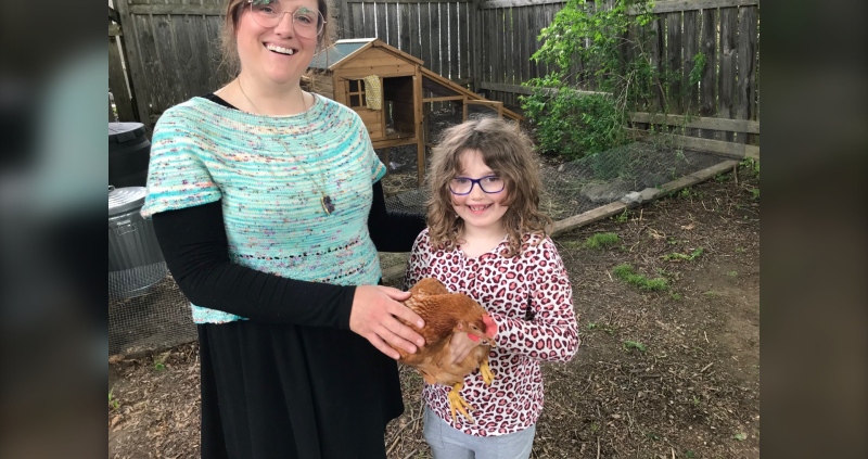 Caitlin and Olivia Newey own four chickens in Kingston. (Kimberley Johnson / CTV News Ottawa)