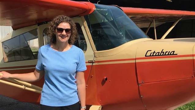 Emily Crombez stands by her own personal aircraft near Tillsonburg, Ont. on Thursday, June 4, 2020. (Sean Irvine / CTV London)