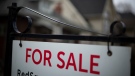A home for sale sign is shown in a Toronto west end neighbourhood May 8, 2020. (THE CANADIAN PRESS / Graeme Roy)