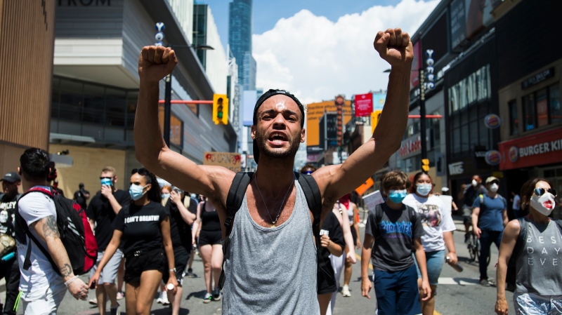 Thousands of people protest at an anti-racism demonstration reflecting anger at the police killings of black people, in Toronto on Friday, June 5, 2020. THE CANADIAN PRESS/Nathan Denette