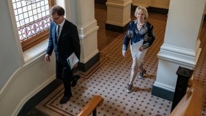 Health Minister Adrian Dix and provincial health officer Dr. Bonnie Henry walk to their COVID-19 briefing on June 1, 2020. (Province of B.C./Flickr)