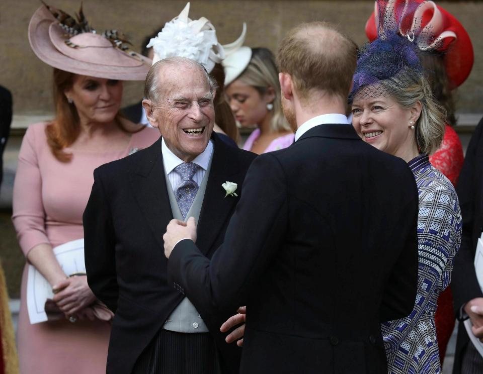 Prince Philip talks to Prince Harry