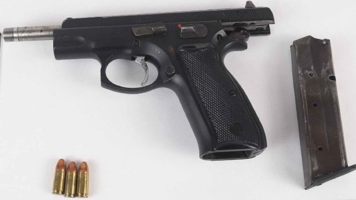 Ottawa Police say a crime handgun, drugs and cash were seized from a home on Wednesday. (Photo courtesy; Ottawa Police Service)