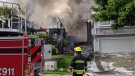 A massive house fire destroyed most of one home and significantly damaged another in Langley Saturday evening. (CTV)