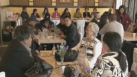 Filipino-Canadians gather at Casa Manila restaurant to help raise donations for victims of the typhoons in the Philippines.