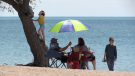 Sun-seekers enjoying the first day of Goderich's Main Beach which reopened (Scott Miller / CTV News)