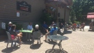 Golfers enjoy the patio at Oakwood Resort in Huron County, Ont. on Monday, June 15, 2020. (Brent Lale / CTV London)