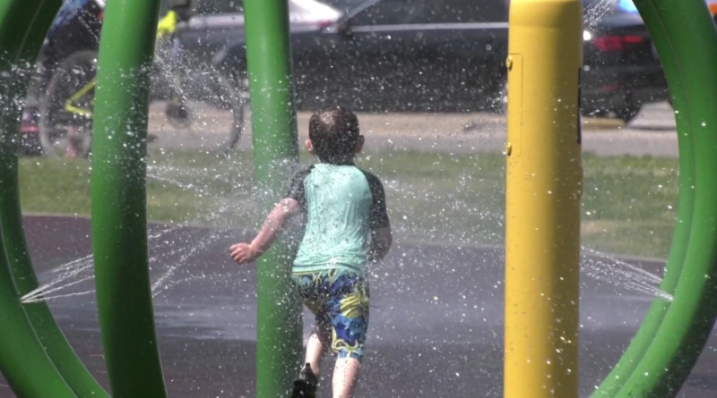 Boy runs through spray of splash pad in Timmins. Jun 17/20 (Lydia Chubak/CTV Northern Ontario)