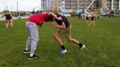 Wrestlers are once again allowed to work out against each other at the University of Calgary, albeit outside. 