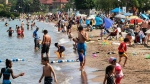 Crowds turned out to Centennial Beach on the first day of summer, Barrie, Ont. on Sat. June 20, 2020 (Don Wright/CTV News)