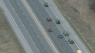 Military vehicles seen on Highway 400 in Ontario in April 2020, en route to CFB Borden for deployment to long-term care homes during the COVID-19 pandemic. (CTV News Toronto)
