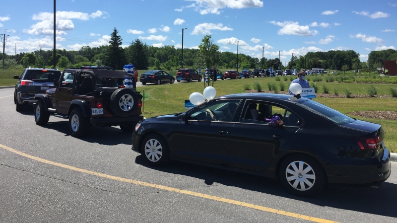 Vehicles taking part in the Lambton College grad parade in Sarnia, Ont. on Wednesday, June 24, 2020. (Bryan Bicknell / CTV News)