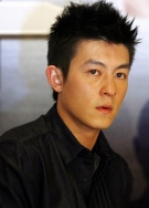 Edison Chen speaks at a press conference for the new film he stars in titled 'The Sniper' in Singapore, April 5, 2009. (AP / Wong Maye-E)