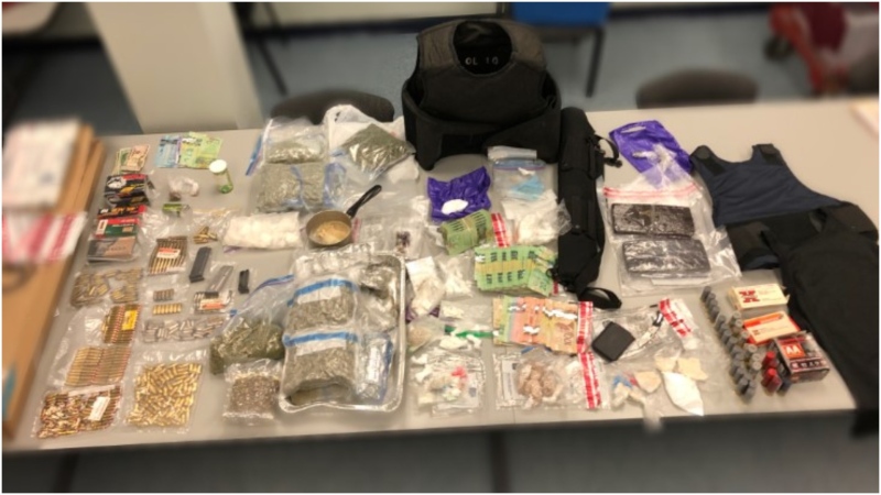 A large quantity of cash, drugs, guns and bullets were seized by Peel Regional Police during on Canada Day. (Supplied) 