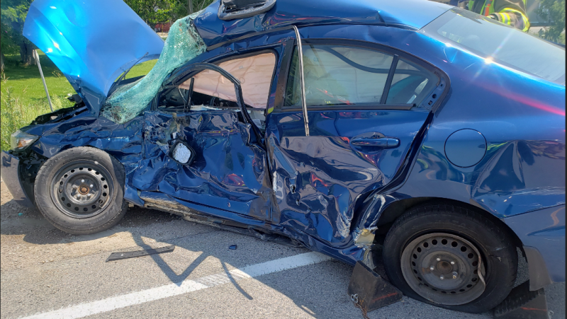 A damaged car is seen following a collision with a transport truck in Russeldale, Ont. on Thursday, July 2, 2020. (Source: OPP)