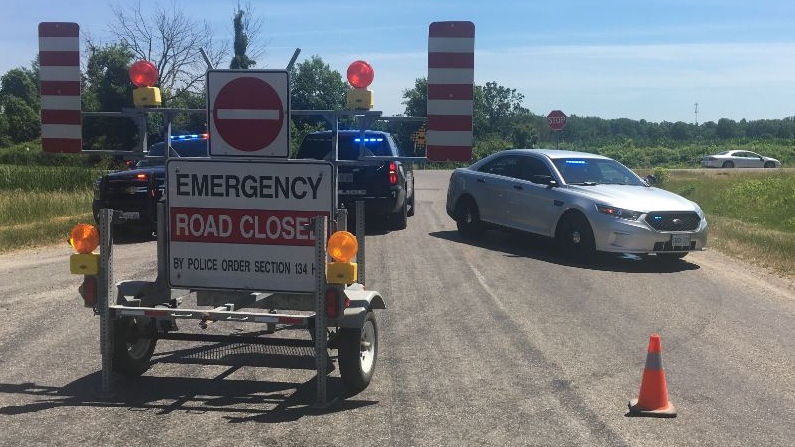 Police investigate after a cyclist was struck by a vehicle on Glendon Drive near Mt. Brydges Ont. on July 5, 2020. (Brent Lale/CTV London)