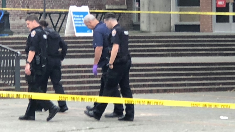 Officers investigate Centennial Square on Monday, after a reported assault with a weapon. (CTV News)