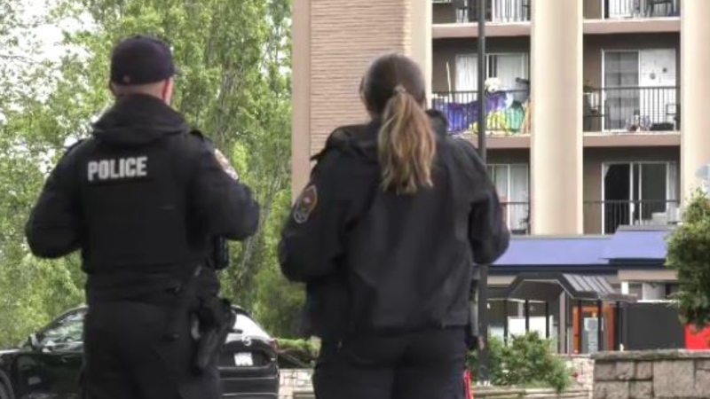 Police attend Victoria's Travelodge hotel on Saturday, July 11, 2020. (CTV News)