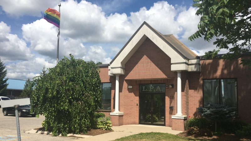 The rainbow Pride flag flies over London Police Association headquarters in London, Ont. on Tuesday, July 14, 2020. (Brent Lale / CTV News)