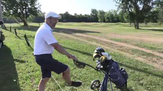 Jim Russell goes over the fence to play River Road GC on July 18, 2020. (Brent Lale/CTV London)