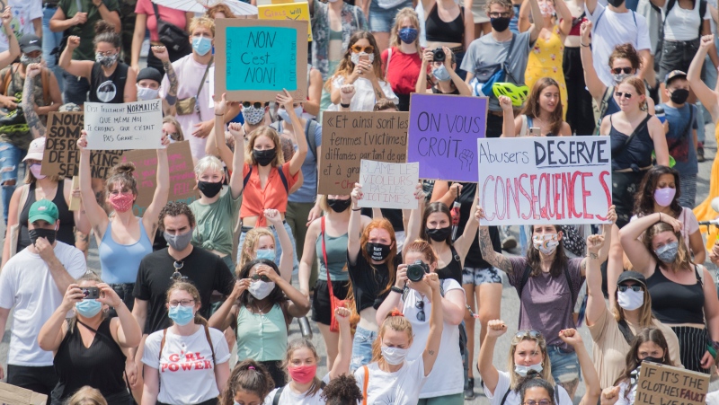 People take part in a demonstration to denounce sexual assault and other forms of sexual violence in the province of Quebec, in Montreal, Sunday, July 19, 2020. THE CANADIAN PRESS/Graham Hughes