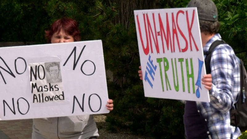 Protestors at an anti-mask rally in Regina, in July 2020. 