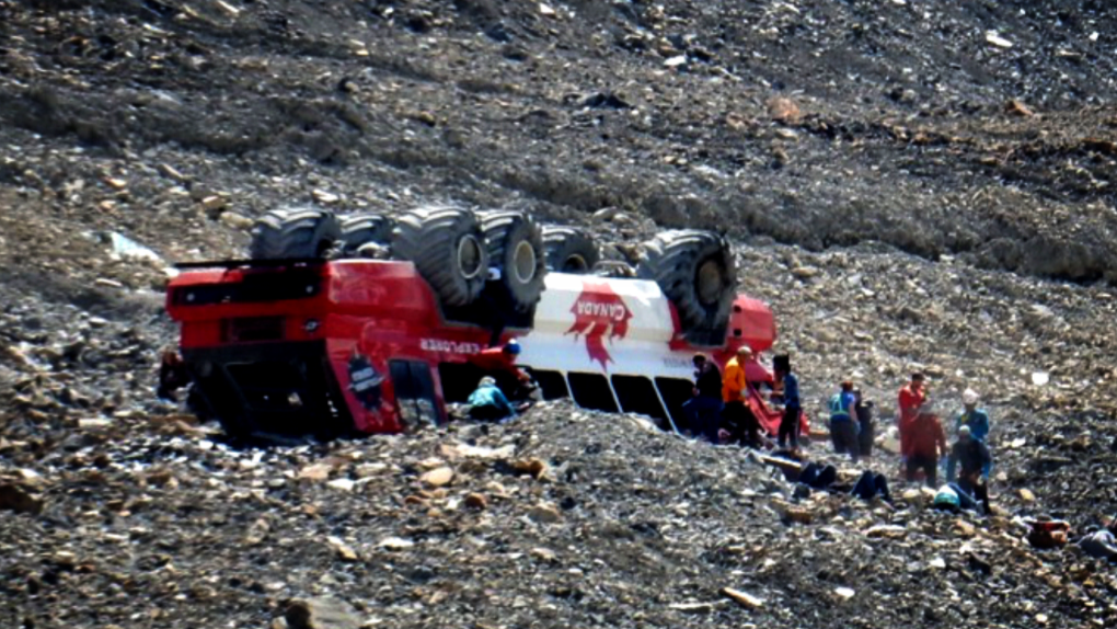 Flipped tour bus at Columbia Icefield