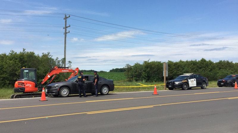 OPP investigate a sudden death north of Strathroy, Ont. on Tuesday, July 21, 2020. (Bryan Bicknell / CTV News)