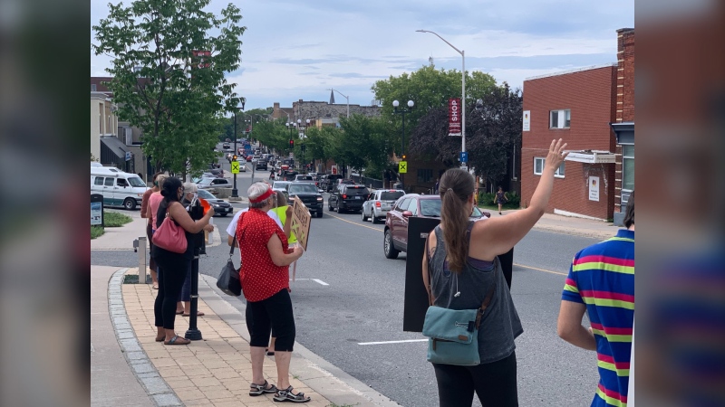 Protesters gather outside Kenora City Hall to protest a proposed anti-loitering bylaw on July 21, 2020 (CTV News Photo Jamie Dowsett)