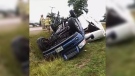Joe Thibert's pickup truck and trailer are seen flipped after being hit by strong winds in the Thedford, Ont. area on Sunday, July 19, 2020. (Source: Susie Guadagno / Facebook)