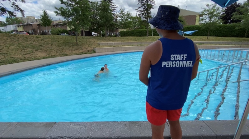 An Ottawa lifeguard watching over swimmers in the wading pool at Jules Morin Park in Lowertown. July 21, 2020. Ottawa, ON. (Tyler Fleming / CTV News Ottawa)