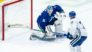 The Vancouver Canucks ramp up the intensity at training camp with a Blue vs. White inter-squad scrimmage at Rogers Arena on July 22, 2020.  Travis Green now has his lines mostly set with only a few roster spots up for grabs. The three-way winger battle between rookie Zack MacEwen, Jake Virtanen and Michael Ferland, who is returning from a concussion, has proven to be the most contested and debated. (Photographer: Anil Sharma) 