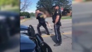 A screenshot of a video showing Russell County OPP arresting a 14-year-old girl with autism Tues. July 21, 2020. The child's face has been blurred, as she cannot be identified under the Youth Criminal Justice Act. 