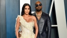 Kim Kardashian West, left, and Kanye West arrive at the Vanity Fair Oscar Party in Beverly Hills, Calif. on Feb. 9, 2020. Kardashian West is asking the public to show compassion and empathy to husband Kanye West, who she says is bipolar and caused a stir this week after fulminating in a series of social media posts. The reality TV star posted a lengthy message Wednesday on her Instagram Live feed, explaining that life has been complicated for her family and West, who ranted against historical figure Harriet Tubman and discussed abortion on Sunday while he declared himself a presidential candidate. (Photo by Evan Agostini/Invision/AP, File)