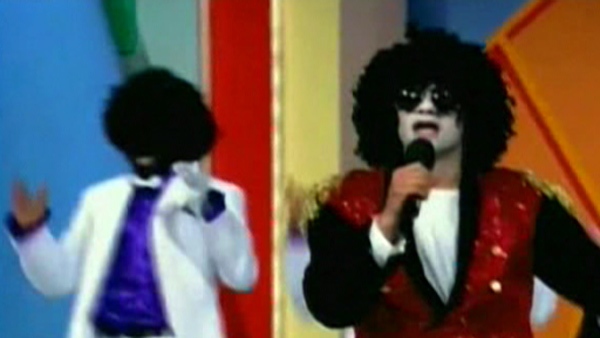 An Australian variety show host has apologized for a skit in which singers parodying the Jackson Five performed in blackface.