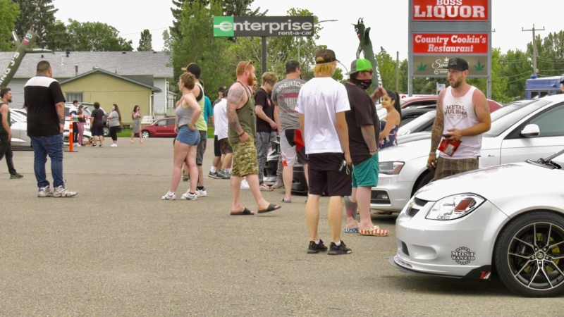 Car and motorcycle enthusiasts converged on Arthur's Carwash at 156 Street and 109 Avenue for a meet-up, irking some residents in the neighbourhood. July 29, 2020. (CTV News Edmonton)