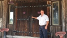 Purple Hill Country Opry Owner George Taylor is seen standing outside the doors to his venue on Thursday, July 30, 2020. (Bryan Bicknell / CTV News) 