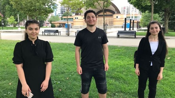 Faiza Qasim (left) and Eflin Aldachi (right) stand with a friend. The two London high school students are organizing a Civic Holiday rally in London to recall the actions of ISIS against the Yazidi people. Both girls lost family members in the 2014 ISIS action. (Sean Irvine CTV News)

