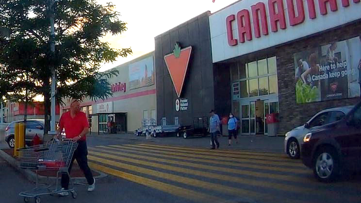 Ottawa police are looking to speak to the three people in this photo, who were in the Canadian Tire parking lot at Merivale Rd./Woodfield Dr. Friday, July 31, at around 8:20 p.m. (Ottawa police handout)
