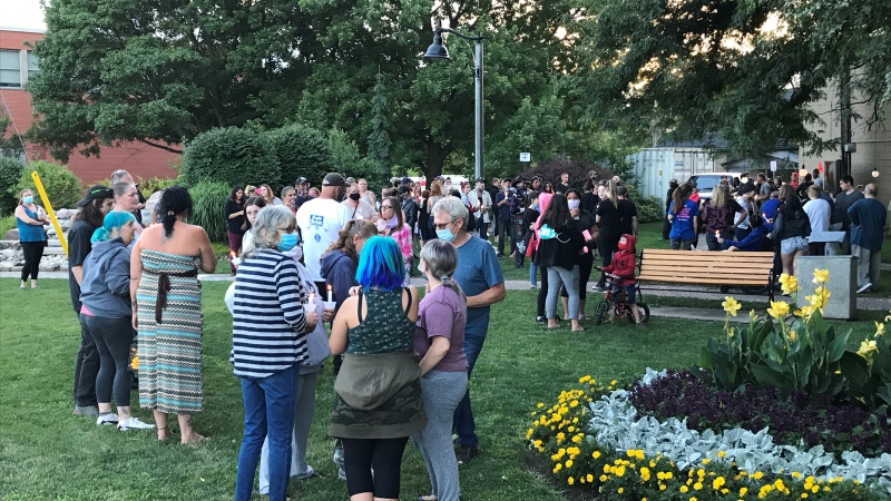 Dozens of people gather in an Ingersoll, Ont. park on Wednesday, Aug. 5, 2020 for a vigil to remember Ashten Fick. 
(Celine Zadorsky / CTV London) 