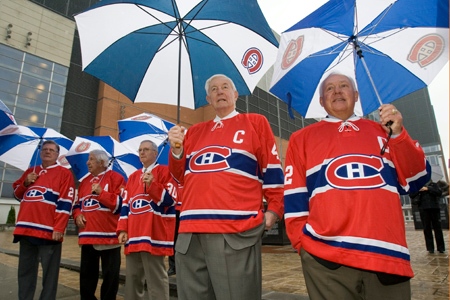 Former Montreal Canadiens Yvan Cournoyer, right, Jean Beliveau, Jean-Guy Morissette, Elmer Lach and Don Johns, left, attend a ceremony changing the name of the street in front of the Bell Center to Montreal Canadiens Avenue to mark the team's 100th anniversary Friday, October 9, 2009 in Montreal. 