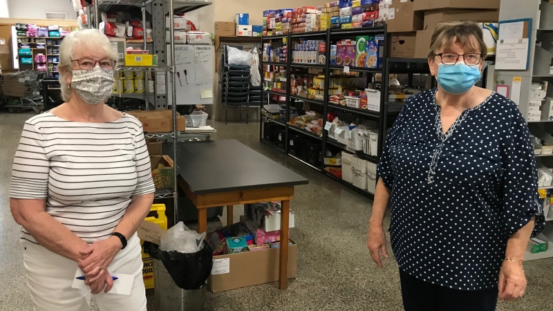 Helping Hand Food Bank Interim Coordinator Brenda Fitzgerald and retiring Coordinator Joan Clarkson are seen in Tillsonburg, Ont. on Friday, Aug. 7, 2020. (Sean Irvine / CTV News) 