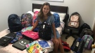 Katie Onesi, 17, of Kingston, Ont. is filling backpacks with school supplies to donate to families ahead of the new school year. (Kimberley Johnson / CTV News Ottawa)