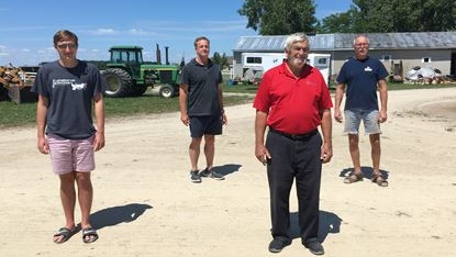 Nathan, David, and Tom Bain with Don McMurren owner of the Kingsville stable the Bain family trains out of in Leamington, Ont on Mon. Aug. 10 2020. (Gary Archibald/CTV Windsor)