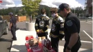 Langford firefighters and members of the Victoria Grizzlies are seen fundraising for the Tim Hortons Children’s Foundation in Langford: (CTV News)