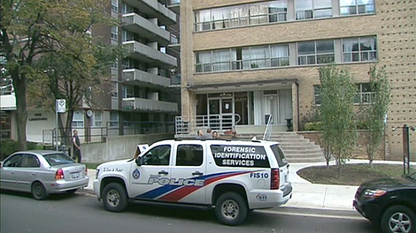 Police say three men stormed a first-floor balcony of the apartment. Two men were shot in the lobby and one died.