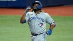 Toronto Blue Jays' Vladimir Guerrero Jr. (27) celebrates after hitting a solo home run off Tampa Bay Rays pitcher Ryan Yarbrough during the second inning of a baseball game Friday, Aug. 21, 2020, in St. Petersburg, Fla. (AP Photo/Chris O'Meara)