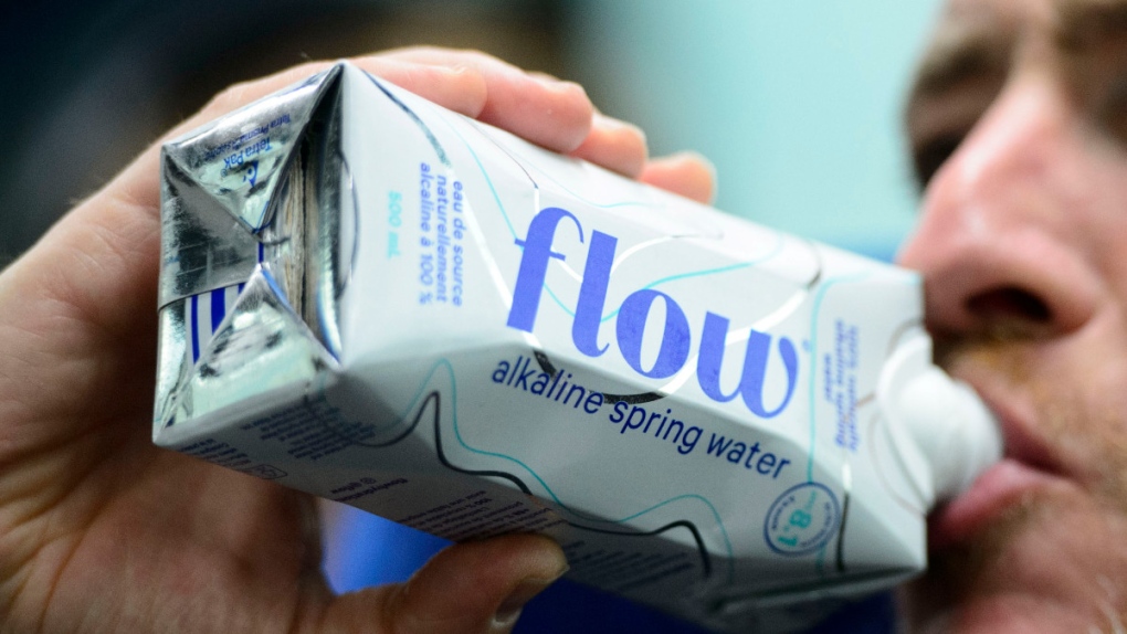 Drinking 'Flow' brand water in Montreal