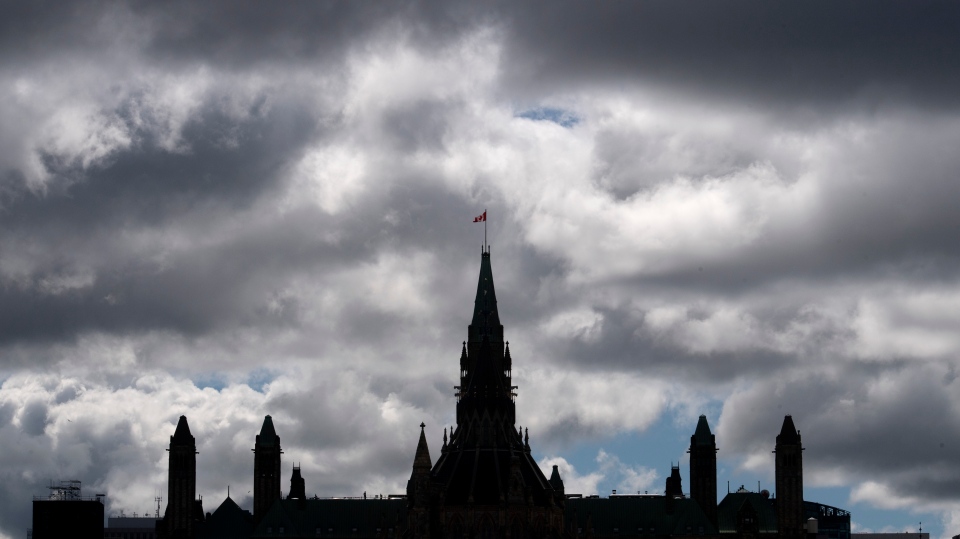 Clouds pass by the parliament buildings